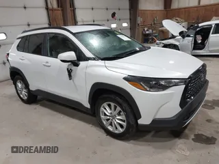 2022 Toyota Corolla Cross LE with VIN 7MUCAABG4NV039856, listed as a IAAI auction lot 42264958 with 20,615 mi miles and . Bid and sale history available at DreamBid. Image 1.