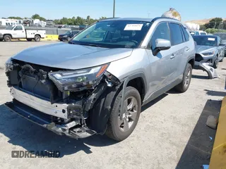 2022 Toyota RAV4 Hybrid XLE with VIN 4T3RWRFV2NU066761, listed as a IAAI auction lot 42784621 with 24,711 mi miles and . Bid and sale history available at DreamBid. Image 2.