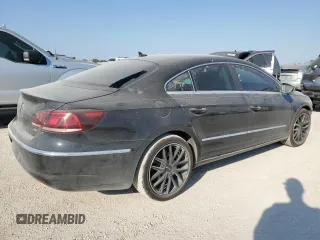 2014 Volkswagen CC R-Line with VIN WVWBN7AN7EE537598, listed as a Copart auction lot 73974244 with 139,476 mi miles and Salvage Title. Bid and sale history available at carsss.com. Image 3.