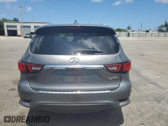 2019 Infiniti QX60 Pure with VIN 5N1DL0MN5KC560950, listed as a Copart auction lot 61051805 with 55,857 mi miles and Salvage title. Bid and sale history available at DreamBid. Image 6.