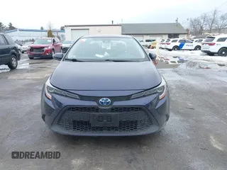 2021 Toyota Corolla Hybrid LE with VIN JTDEAMDE2MJ030035, listed as a IAAI auction lot 41644662 with 130,693 mi miles. Bid and sale history available at carsss.com. Image 12.