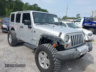 2008 Jeep Wrangler Unlimited Sahara with VIN 1J8GA59138L610451, listed as a IAAI auction lot 42297978 with 110,339 mi miles and . Bid and sale history available at DreamBid. Image 1.