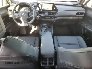 2024 Lexus UX with VIN JTHX6JBH4R2192156, listed as a Copart auction lot 84512994 with 3,320 mi miles and Salvage Title. Bid and sale history available at carsss.com. Image 8.