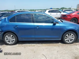 2015 Volkswagen Jetta SE with VIN 3VWD17AJ3FM260636, listed as a IAAI auction lot 42423975 with 129,377 mi miles and . Bid and sale history available at DreamBid. Image 13.