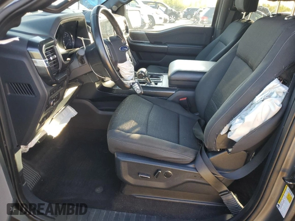 2021 Ford F-150 XL with VIN 1FTFW1E55MFA77310, listed as a Copart auction lot 56179055 with 48,990 mi miles and Salvage title. Bid and sale history available at DreamBid. Image 7.