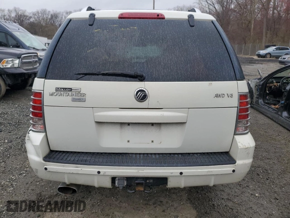 2004 Mercury Mountaineer Convenience z VIN 4M2DU86W04ZJ04788, wystawiony jako Copart lot #50000765 z przebiegiem 193 351 mil mil oraz Szkoda całkowita • Salvage title. Historia ofert i sprzedaży dostępna na DreamBid. Obrazek 6.