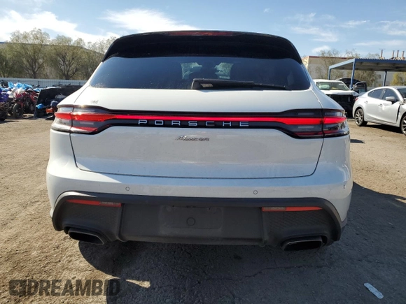2023 Porsche Macan with VIN WP1AA2A59PLB10768, listed as a Copart auction lot 49745285 with 42,800 mi miles and Salvage Title. Bid and sale history available at carsss.com. Image 6.