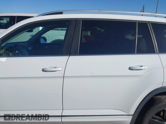 2018 Volkswagen Atlas SEL with VIN 1V2RR2CA1JC566065, listed as a IAAI auction lot 41687434 with 77,795 mi miles and . Bid and sale history available at DreamBid. Image 14.