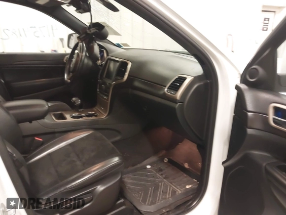 2015 Jeep Grand Cherokee Laredo with VIN 1C4RJFAG6FC606431, listed as a IAAI auction lot 41754182 with 99,987 mi miles. Bid and sale history available at carsss.com. Image 5.