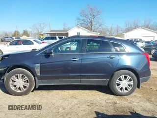 2015 Cadillac SRX with VIN 3GYFNAE35FS608595, listed as a IAAI auction lot 41282751 with 127,055 mi miles and . Bid and sale history available at DreamBid. Image 15.