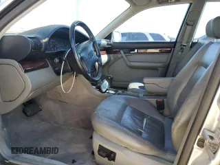 1996 Audi A6 z VIN WAUFA84A9TN007235, wystawiony jako Copart lot #78278774 z przebiegiem 148 857 mil mil oraz Tytuł czysty. Historia ofert i sprzedaży dostępna na DreamBid. Obrazek 7.