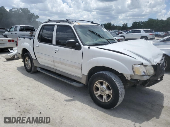 2003 Ford Explorer Sport Trac XLS with VIN 1FMZU67E43UB37127, listed as a Copart auction lot 58377075 with 219,033 mi miles and Salvage title. Bid and sale history available at DreamBid. Image 4.