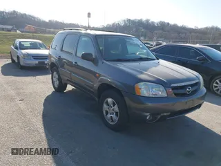 2004 Mazda Tribute LX with VIN 4F2YZ04114KM13048, listed as a IAAI auction lot 41800446 with 152,303 mi miles and . Bid and sale history available at DreamBid. Image 1.