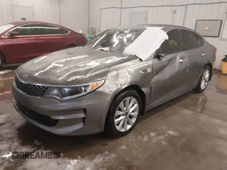 2017 Kia Optima EX with VIN 5XXGU4L36HG143321, listed as a IAAI auction lot 41589617 with 116,972 mi miles. Bid and sale history available at carsss.com. Image 2.