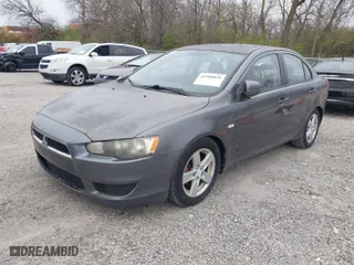 2008 Mitsubishi Lancer DE with VIN JA3AU26U48U012900, listed as a IAAI auction lot 41988059 with 216,797 mi miles. Bid and sale history available at carsss.com. Image 2.