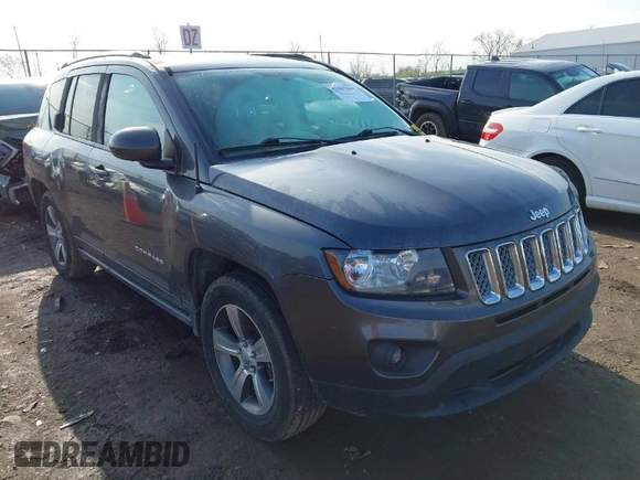 2016 Jeep Compass High Altitude Edition with VIN 1C4NJCEA1GD720030, listed as a IAAI auction lot 41987061 with 167,872 mi miles. Bid and sale history available at carsss.com. Image 1.