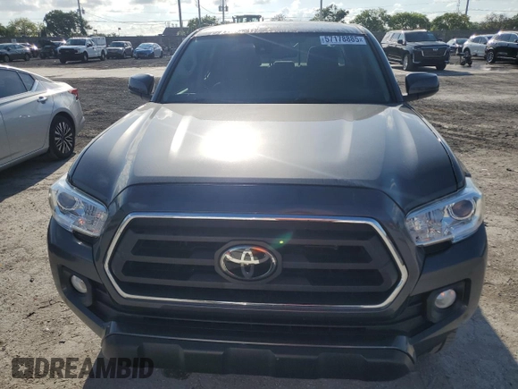 2020 Toyota Tacoma SR5 with VIN 3TMAZ5CN9LM125157, listed as a Copart auction lot 57178885 with 59,830 mi miles and Salvage title. Bid and sale history available at DreamBid. Image 5.