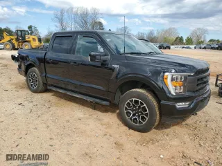 2023 Ford F-150 XL with VIN 1FTFW1E59PKE02763, listed as a Copart auction lot 49326355 with 26,674 mi miles and Salvage Title. Bid and sale history available at carsss.com. Image 4.