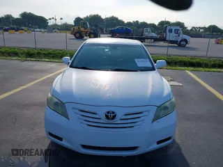 2007 Toyota Camry CE z VIN 4T1BE46K27U670867, wystawiony jako IAAI lot #42398921 z przebiegiem 142 655 mil mil oraz . Historia ofert i sprzedaży dostępna na DreamBid. Obrazek 12.