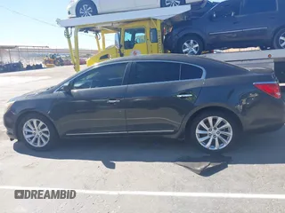 2014 Buick LaCrosse with VIN 1G4GA5GR7EF300907, listed as a IAAI auction lot 41835137 with 154,838 mi miles and . Bid and sale history available at DreamBid. Image 14.