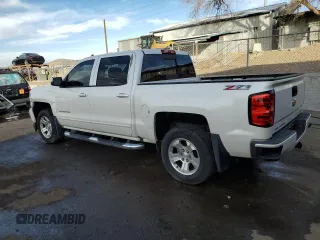 2016 Chevrolet Silverado 1500 LT with VIN 3GCUKREC3GG357911, listed as a Copart auction lot 43985735 with 145,647 mi miles and Salvage Title. Bid and sale history available at DreamBid. Image 2.