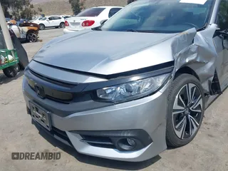 2018 Honda Civic EX-L z VIN JHMFC1F79JX037843, wystawiony jako IAAI lot #42121623 z przebiegiem 49 759 mil mil oraz . Historia ofert i sprzedaży dostępna na DreamBid. Obrazek 19.