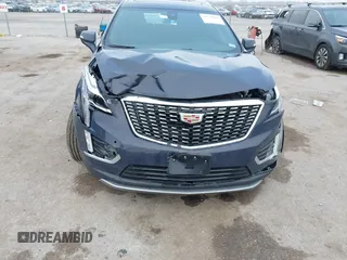 2024 Cadillac XT5 FWD Premium Luxury with VIN 1GYKNCR47RZ755652, listed as a IAAI auction lot 41512069 with 10,243 mi miles. Bid and sale history available at carsss.com. Image 6.