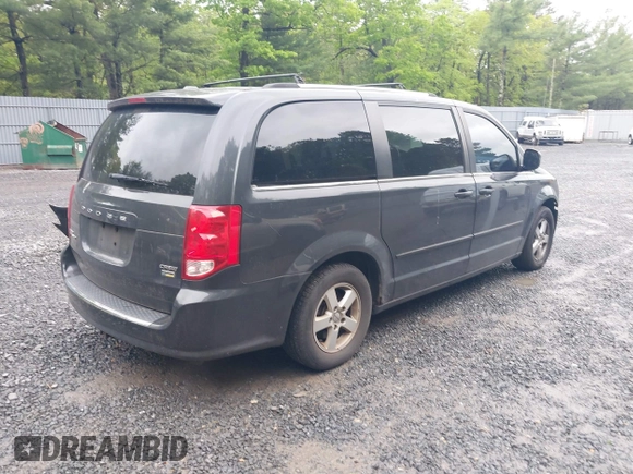 2011 Dodge Grand Caravan Crew with VIN 2D4RN5DG2BR706668, listed as a IAAI auction lot 39440091 with 191,666 mi miles and . Bid and sale history available at DreamBid. Image 4.