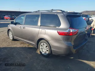 2016 Toyota Sienna XLE with VIN 5TDYK3DC6GS710062, listed as a IAAI auction lot 40953646 with 145,233 mi miles. Bid and sale history available at carsss.com. Image 3.