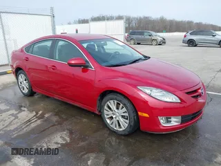2009 Mazda 6 i Grand Touring with VIN 1YVHP82AX95M33869, listed as a IAAI auction lot 41709478 with 163,682 mi miles. Bid and sale history available at carsss.com. Image 1.