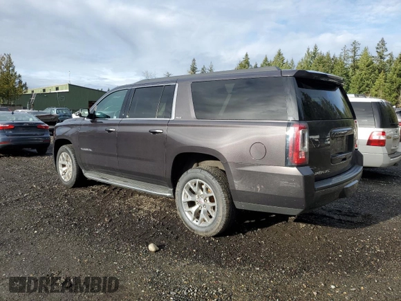 2015 GMC Yukon XL SLT with VIN 1GKS2HKC7FR282543, listed as a Copart auction lot 84996754 with 153,840 mi miles and Clean Title. Bid and sale history available at carsss.com. Image 2.