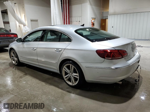 2014 Volkswagen CC VR6 Executive 4Motion with VIN WVWGU7AN5EE525409, listed as a Copart auction lot 83964324 with 118,465 mi miles and Salvage Title. Bid and sale history available at carsss.com. Image 2.