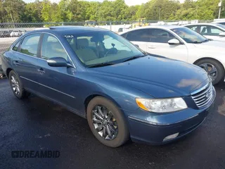 2009 Hyundai Azera Limited z VIN KMHFC46FX9A343602, wystawiony jako IAAI lot #42255032 z przebiegiem 141 994 mil mil oraz . Historia ofert i sprzedaży dostępna na DreamBid. Obrazek 1.
