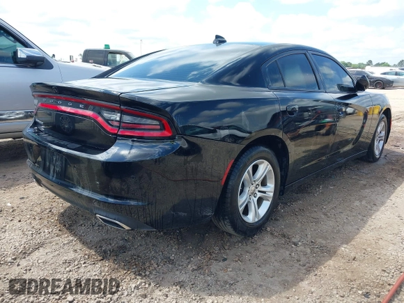 2023 Dodge Charger SXT with VIN 2C3CDXBG2PH550671, listed as a IAAI auction lot 42123200 with 50,818 mi miles. Bid and sale history available at carsss.com. Image 4.
