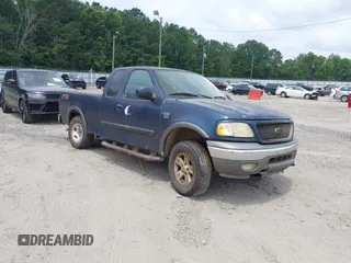 2003 Ford F-150 XL with VIN 1FTRX18W63NA57957, listed as a IAAI auction lot 42514779 with 406,771 mi miles and . Bid and sale history available at DreamBid. Image 1.