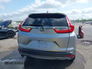 2018 Honda CR-V Touring with VIN 7FARW1H90JE012526, listed as a IAAI auction lot 42055078 with 96,098 mi miles and . Bid and sale history available at DreamBid. Image 16.