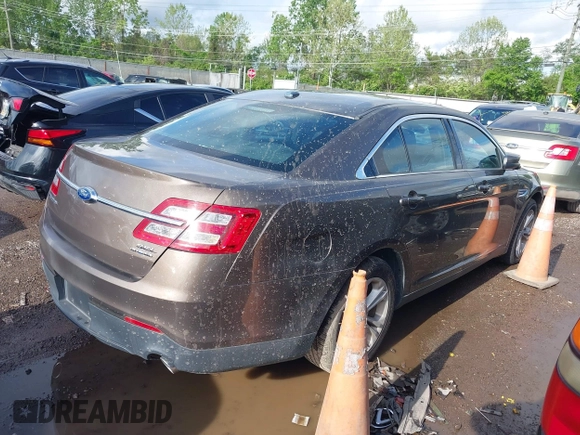 2015 Ford Taurus SEL with VIN 1FAHP2E87FG194170, listed as a IAAI auction lot 42184749 with 222,609 mi miles and . Bid and sale history available at carsss.com. Image 4.