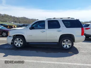2008 GMC Yukon SLT w/4SB with VIN 1GKFK13078R209074, listed as a IAAI auction lot 41869070 with 180,950 mi miles. Bid and sale history available at carsss.com. Image 14.
