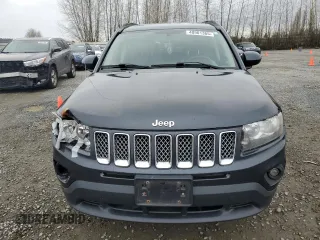 2014 Jeep Compass Latitude with VIN 1C4NJDEB4ED601769, listed as a Copart auction lot 48901365 with 129,826 mi miles and Salvage Title. Bid and sale history available at carsss.com. Image 5.