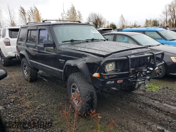 1996 Jeep Cherokee Sport with VIN 1J4FJ68S4TL240696, listed as a Copart auction lot 81193184 with 125,682 mi miles and Salvage Title. Bid and sale history available at carsss.com. Image 4.
