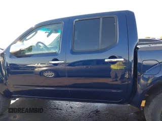 2006 Nissan Frontier SE z VIN 1N6AD07W56C433031, wystawiony jako IAAI lot #41382847 z przebiegiem 80 576 mil mil oraz . Historia ofert i sprzedaży dostępna na DreamBid. Obrazek 14.