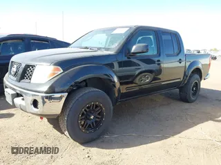2007 Nissan Frontier SE z VIN 1N6AD07U57C442876, wystawiony jako IAAI lot #41975510 z przebiegiem 170 932 mil mil oraz . Historia ofert i sprzedaży dostępna na DreamBid. Obrazek 17.