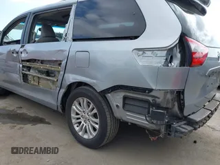 2015 Toyota Sienna XLE with VIN 5TDYK3DC1FS611521, listed as a IAAI auction lot 42136356 with 102,734 mi miles. Bid and sale history available at carsss.com. Image 6.