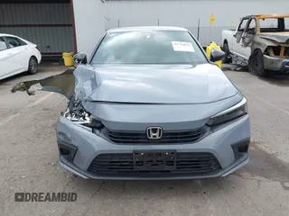 2022 Honda Civic Sport z VIN 2HGFE2F58NH569211, wystawiony jako IAAI lot #41784870 z przebiegiem 22 255 mil mil oraz . Historia ofert i sprzedaży dostępna na DreamBid. Obrazek 12.