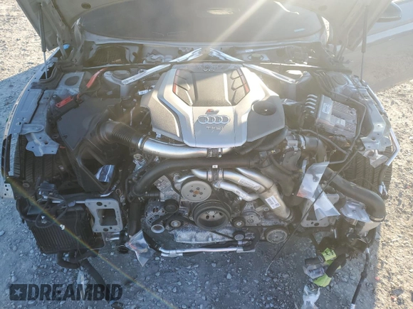 2021 Audi RS 5 z VIN WUANWAF5XMA903675, wystawiony jako Copart lot #86527284 z przebiegiem 27 445 mil mil oraz Szkoda całkowita • Salvage title. Historia ofert i sprzedaży dostępna na DreamBid. Obrazek 12.