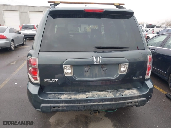 2006 Honda Pilot EX-L with VIN 2HKYF18526H563831, listed as a IAAI auction lot 41255427 with 237,074 mi miles. Bid and sale history available at carsss.com. Image 16.