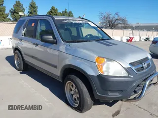 2002 Honda CR-V LX z VIN JHLRD68422C018493, wystawiony jako IAAI lot #41680645 z przebiegiem 165 079 mil mil oraz . Historia ofert i sprzedaży dostępna na DreamBid. Obrazek 1.