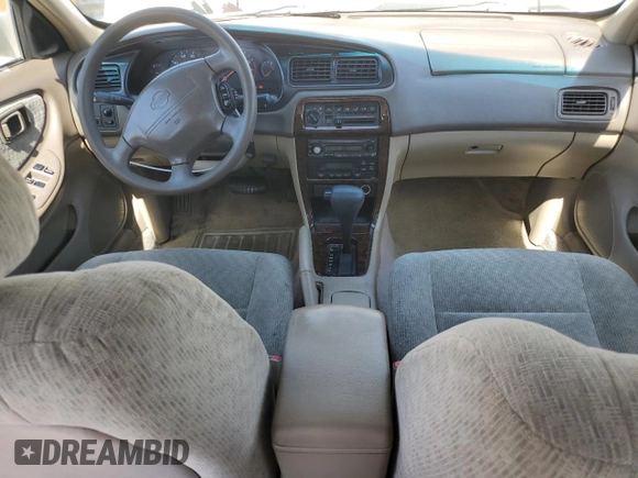 2000 Nissan Altima XE z VIN 1N4DL01D5YC243801, wystawiony jako Copart lot #52642985 z przebiegiem 237 665 mil mil oraz Szkoda całkowita • Salvage title. Historia ofert i sprzedaży dostępna na DreamBid. Obrazek 8.
