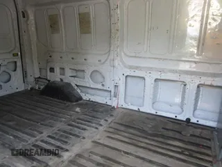 2016 Ford Transit z VIN 1FTBW2XM7GKA18909, wystawiony jako IAAI lot #42457068 z przebiegiem 211 276 mil mil oraz . Historia ofert i sprzedaży dostępna na DreamBid. Obrazek 1.