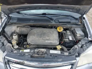 2014 Chrysler Town & Country Touring with VIN 2C4RC1BG7ER208324, listed as a IAAI auction lot 42102263 with 223,953 mi miles. Bid and sale history available at carsss.com. Image 10.